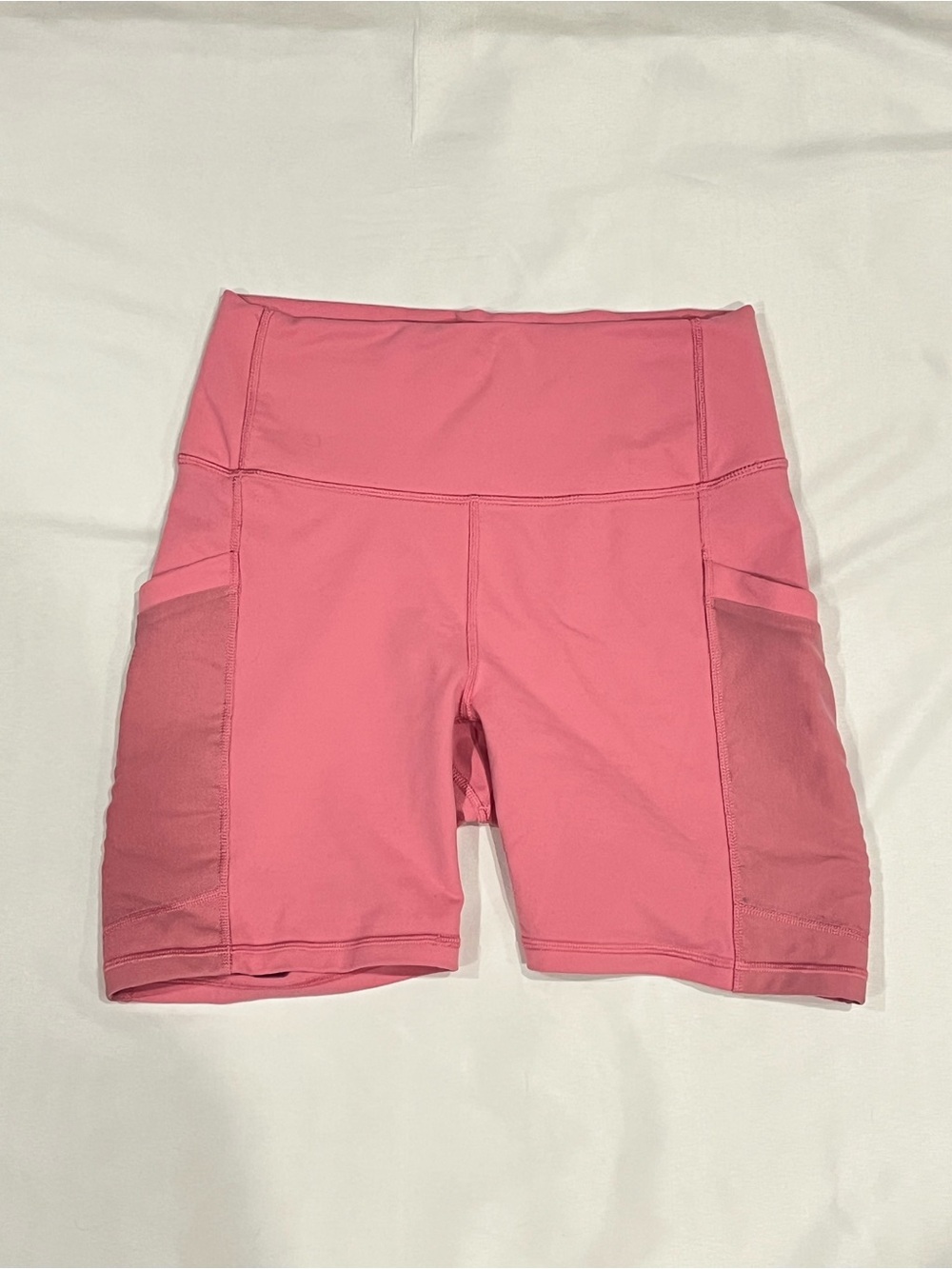 Fabletics Women's High-Rise Pink Active Bike Shorts with Side Pockets